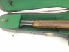 Fucile a canne mozze a doppia canna / pistola da carrozza in custodia di violino.